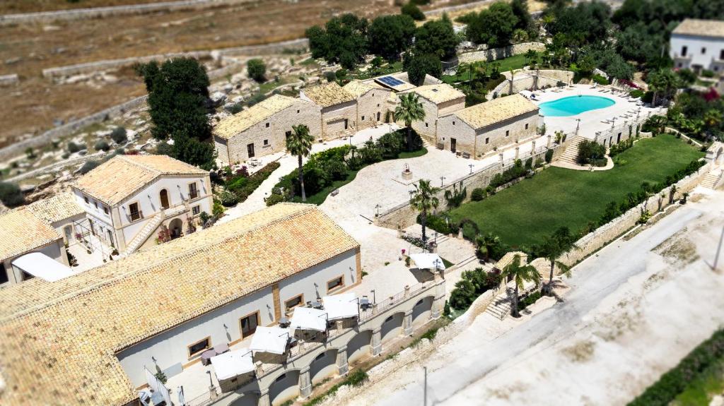an aerial view of a house with a swimming pool at Silva Suri in Marina di Ragusa
