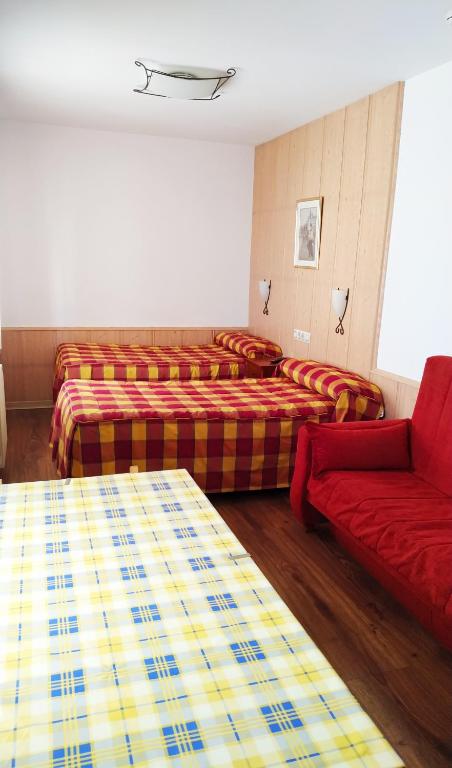 Postel nebo postele na pokoji v ubytování Hotel Rural Casa Ramiro