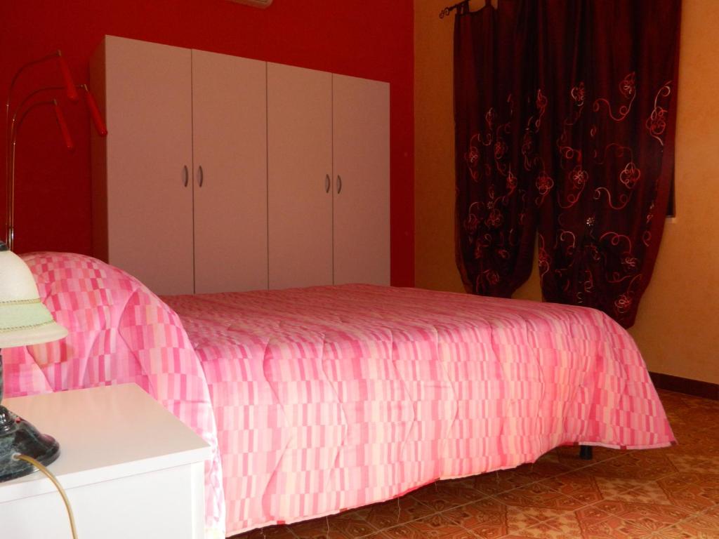 Postel nebo postele na pokoji v ubytování Villa Robinia