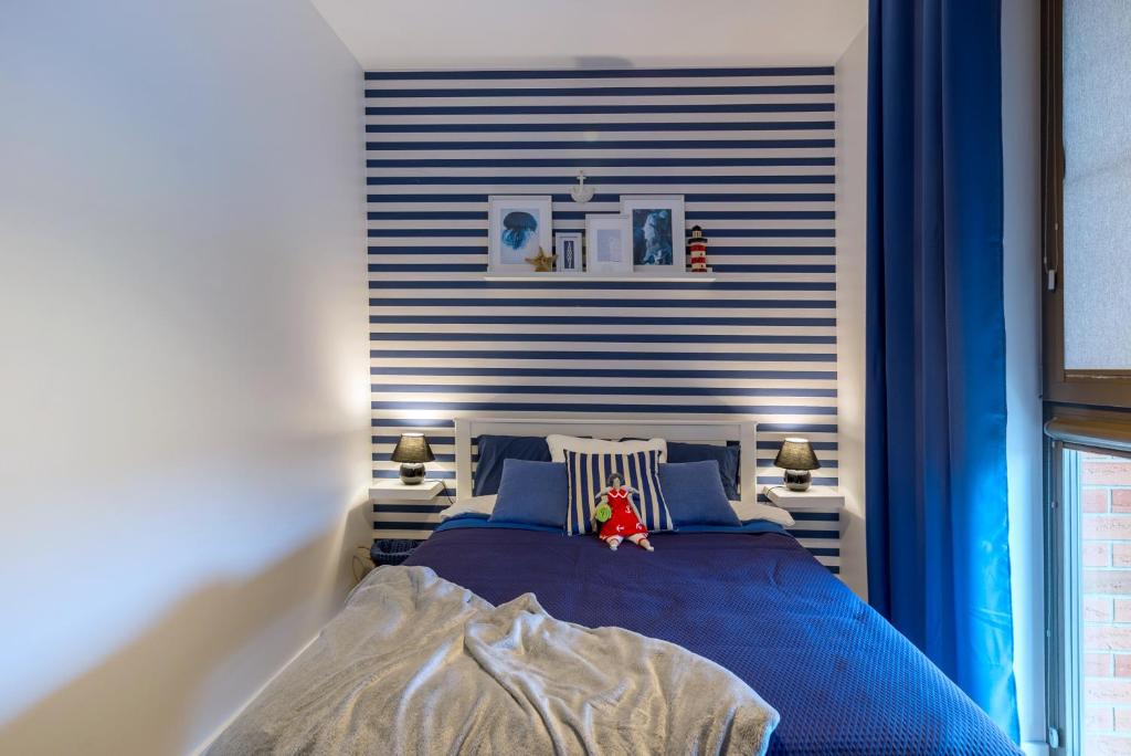 Postel nebo postele na pokoji v ubytování Anchor Apartments MARINE