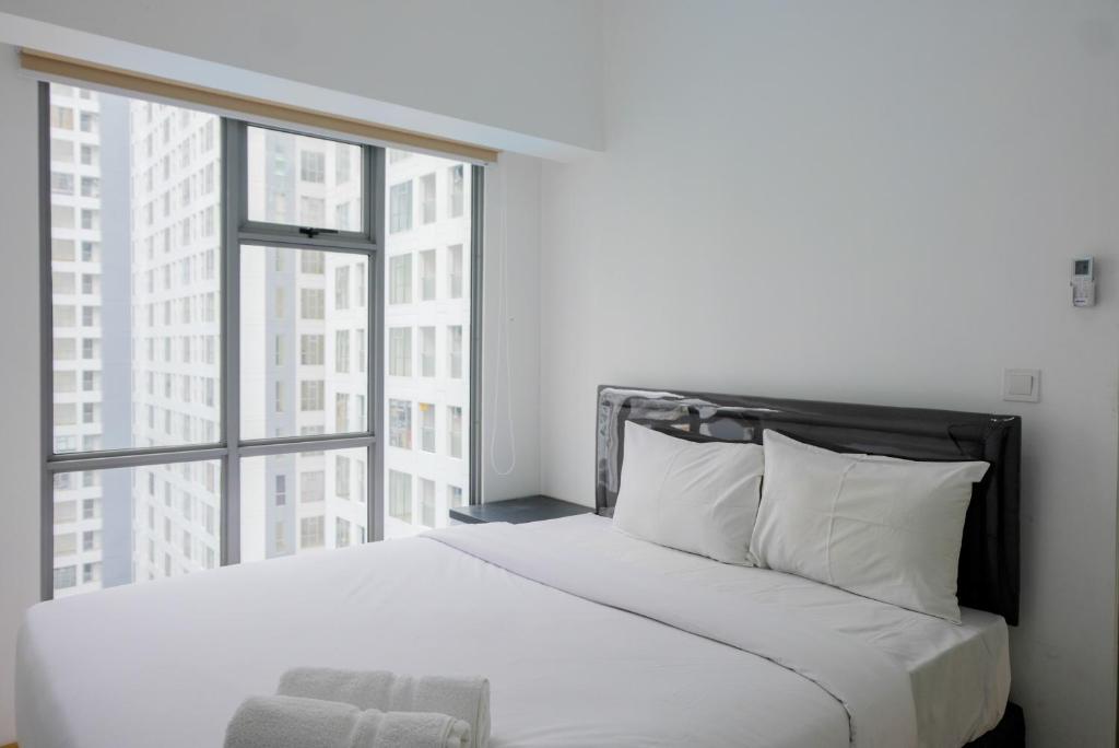 Spacious 3BR Apartment at M-Town Residence By Travelio