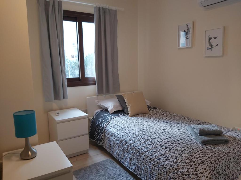 Postel nebo postele na pokoji v ubytování Galatex Beach Apartment