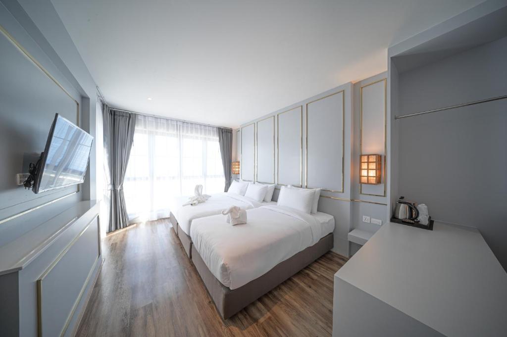 The Wing Boutique Hotel - Family Junior Suite