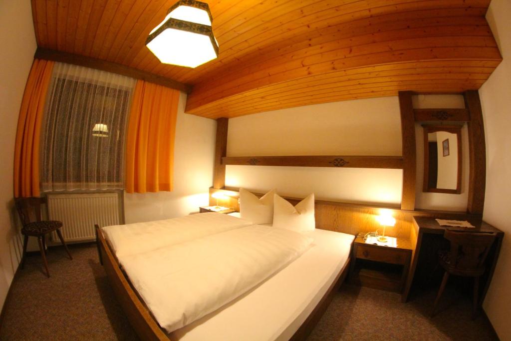 Postel nebo postele na pokoji v ubytování Ferienappartements Heinzle - Ihr Ferienresort