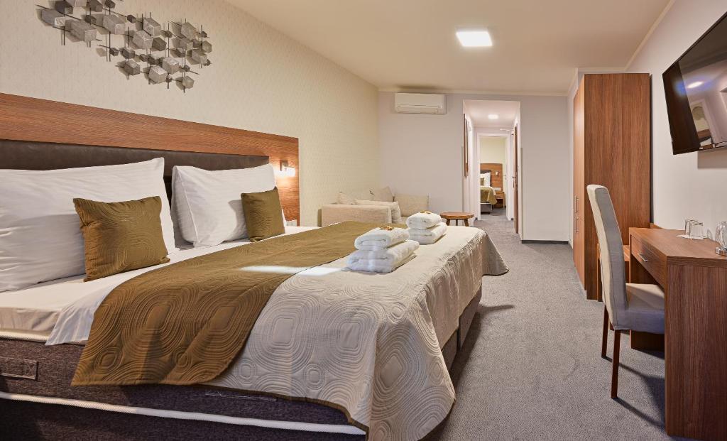 Postel nebo postele na pokoji v ubytování Hotel Prague Star