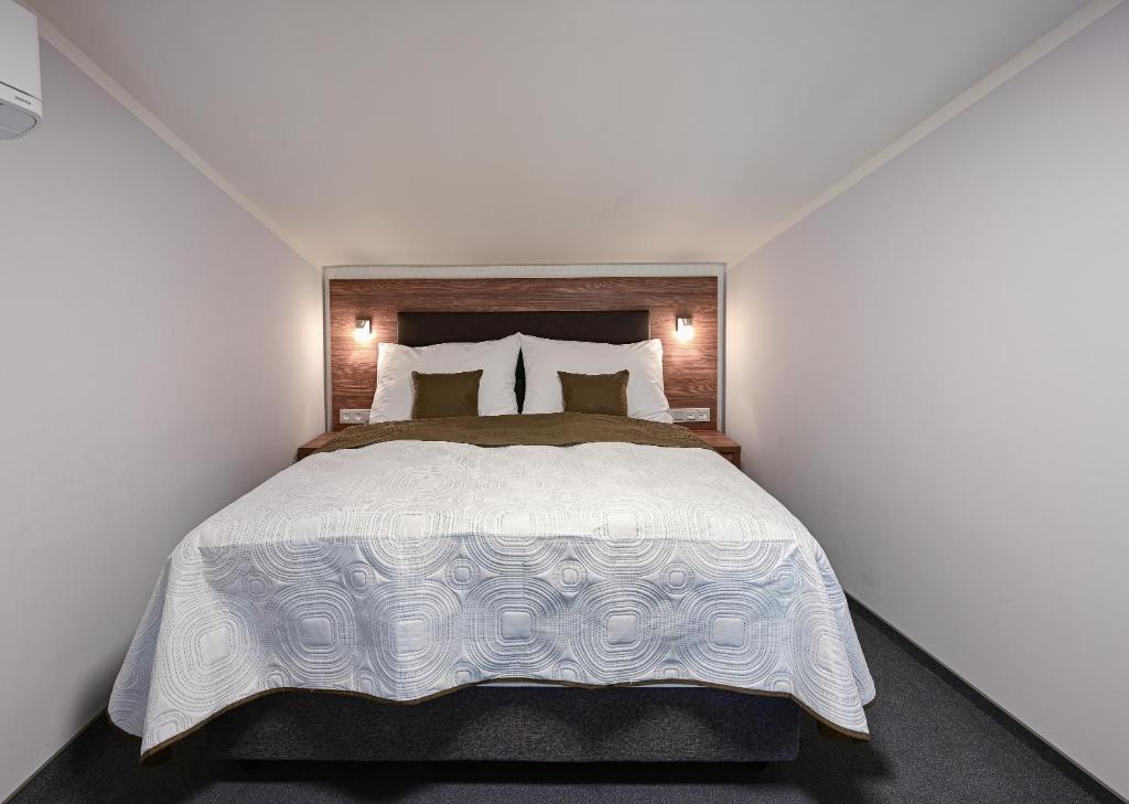 Postel nebo postele na pokoji v ubytování Hotel Prague Star