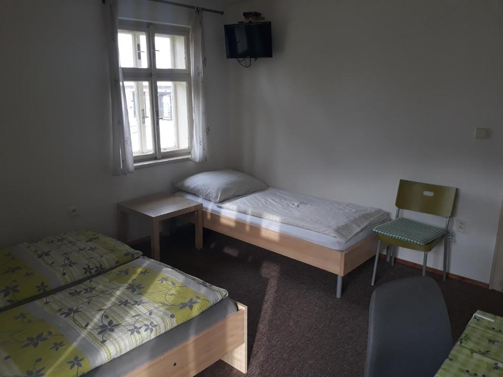Postel nebo postele na pokoji v ubytování Vila Martin