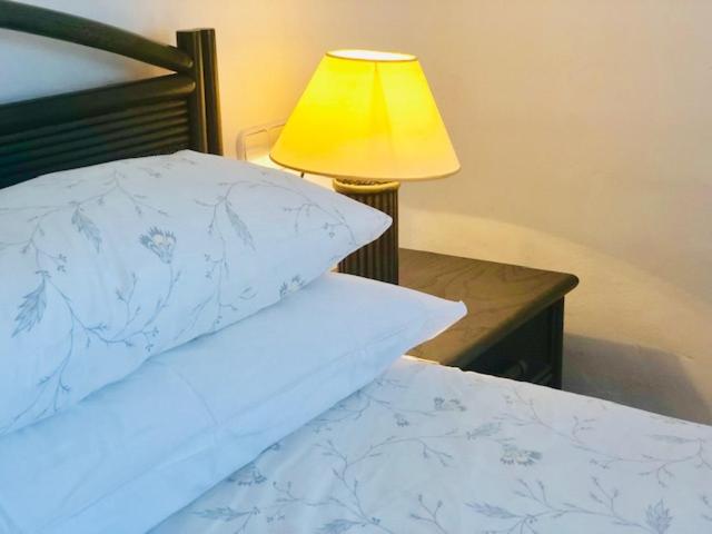 Łóżko lub łóżka w pokoju w obiekcie Chalet El Encanto