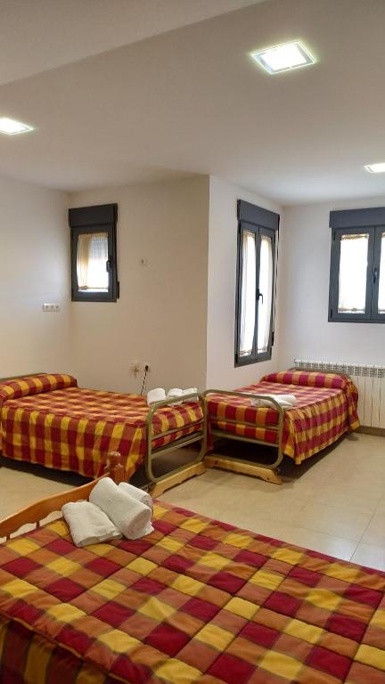 Postel nebo postele na pokoji v ubytování Hotel Rural Casa Ramiro