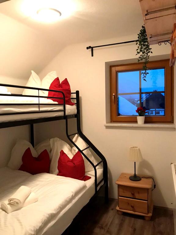 Postel nebo postele na pokoji v ubytování Haus Bayliss