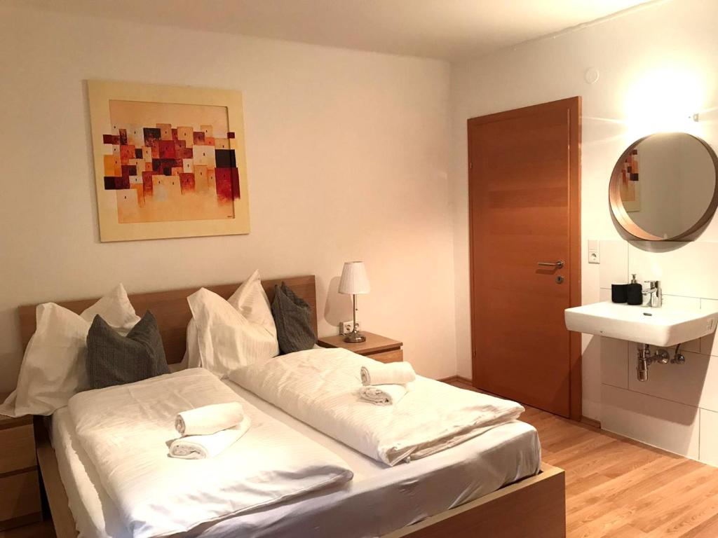 Postel nebo postele na pokoji v ubytování Haus Bayliss