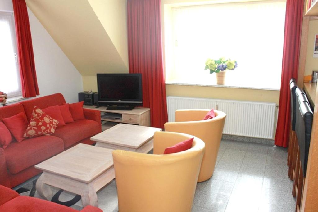 2 bedrooms appartement with garden and wifi at Westerland Sylt 1 km away from the beachにあるシーティングエリア