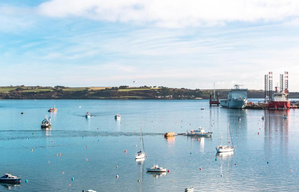a group of boats in a large body of water at Star & Garter in Falmouth