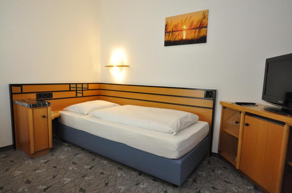 Postel nebo postele na pokoji v ubytování Villa Waldperlach by Blattl