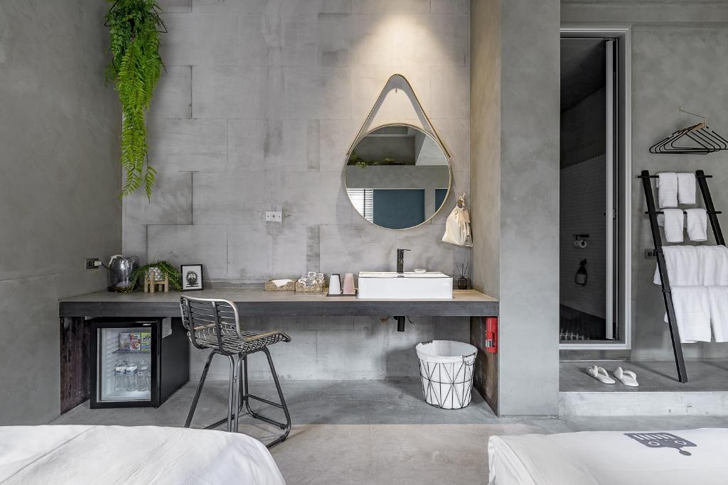 Postel nebo postele na pokoji v ubytování Loft Inn