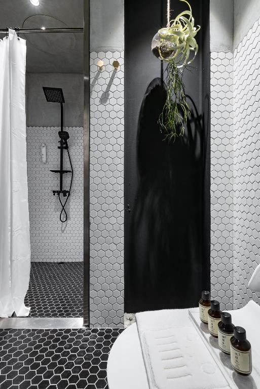 Koupelna v ubytování Loft Inn