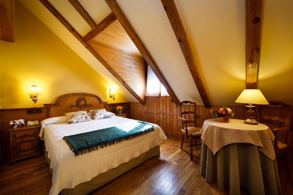 Postel nebo postele na pokoji v ubytování Hotel Ciria