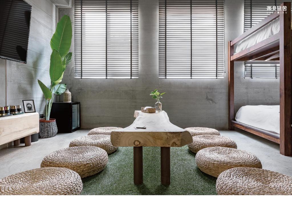 Postel nebo postele na pokoji v ubytování Loft Inn