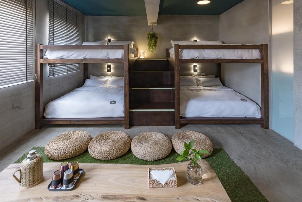 Postel nebo postele na pokoji v ubytování Loft Inn