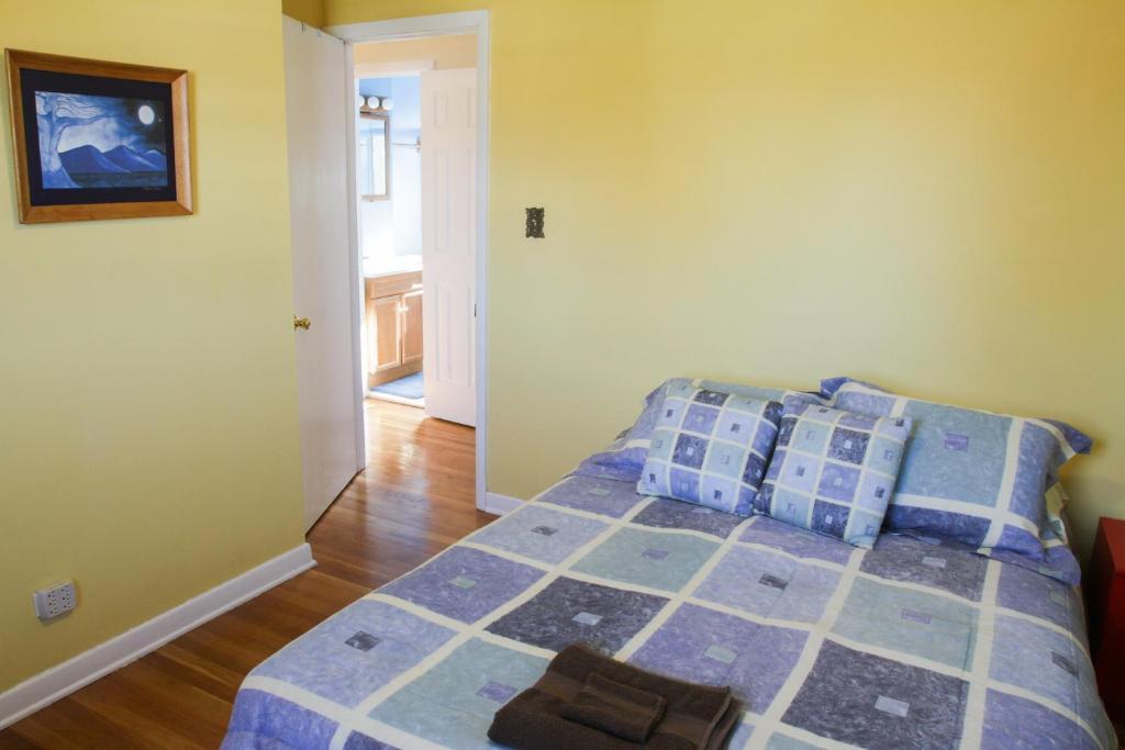 Postel nebo postele na pokoji v ubytování Fairhaven Guesthouse