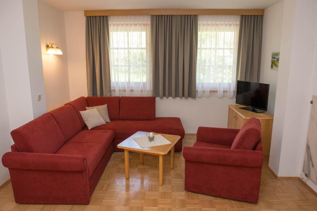 TV a/nebo společenská místnost v ubytování Ferienhaus Franz