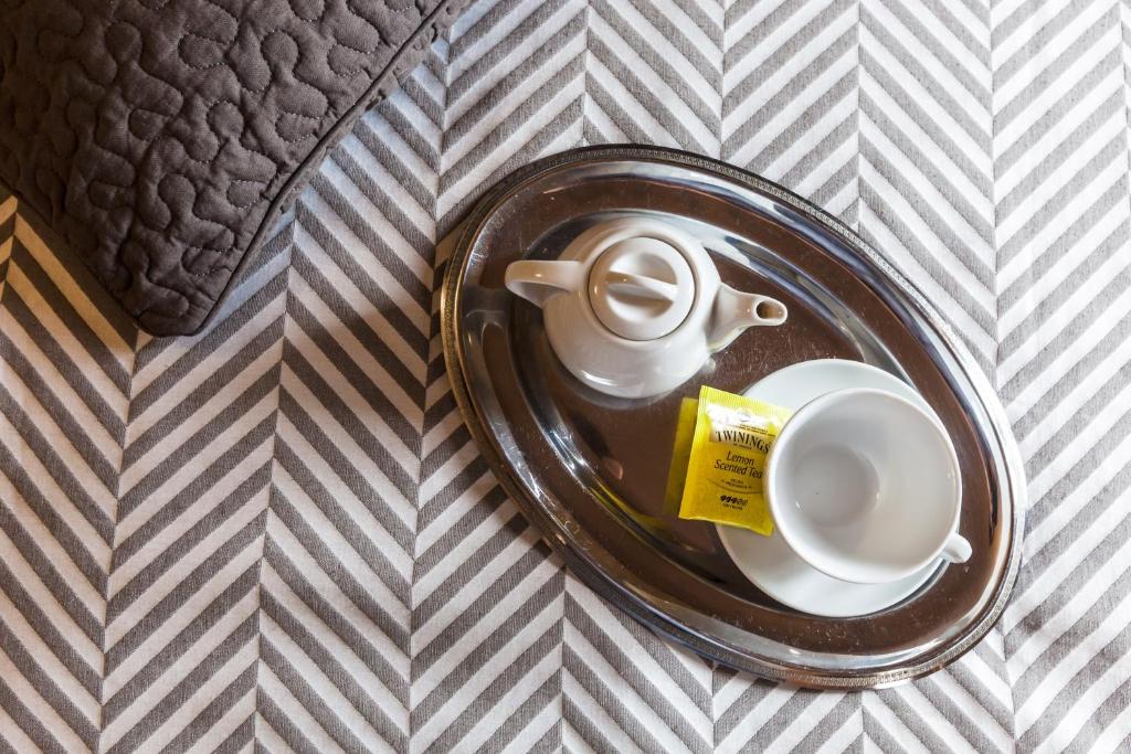 Příslušenství pro přípravu čaje a kávy v ubytování Cuneo Hotel