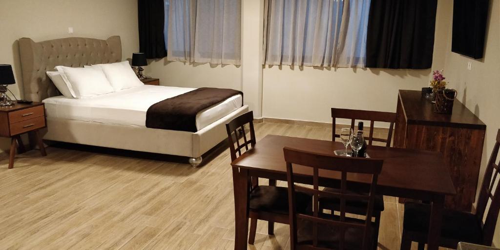 Postel nebo postele na pokoji v ubytování Pallada Athens boutique rooms & apartments