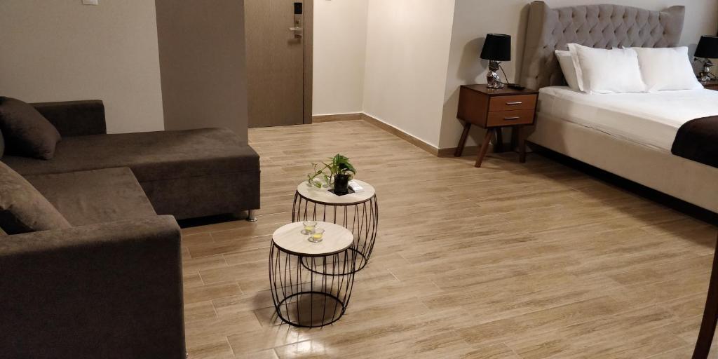 Postel nebo postele na pokoji v ubytování Pallada Athens boutique rooms & apartments