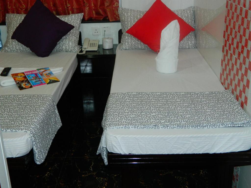 Letto o letti in una camera di New London Hostel