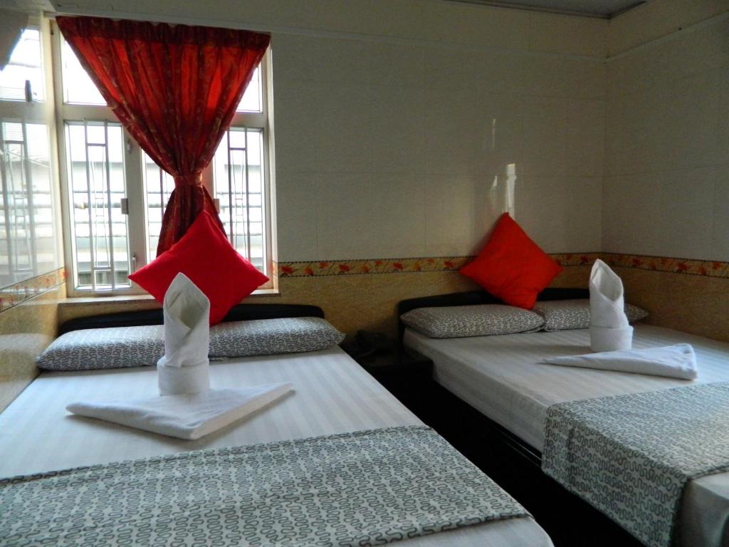 Letto o letti in una camera di New London Hostel