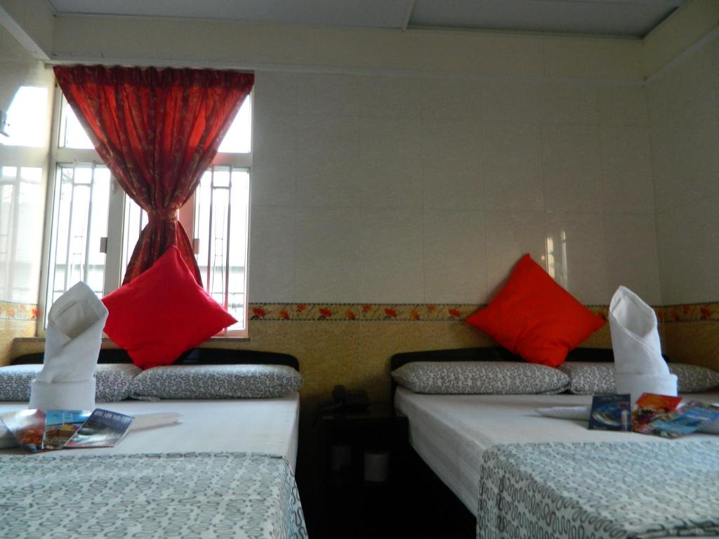 Letto o letti in una camera di New London Hostel