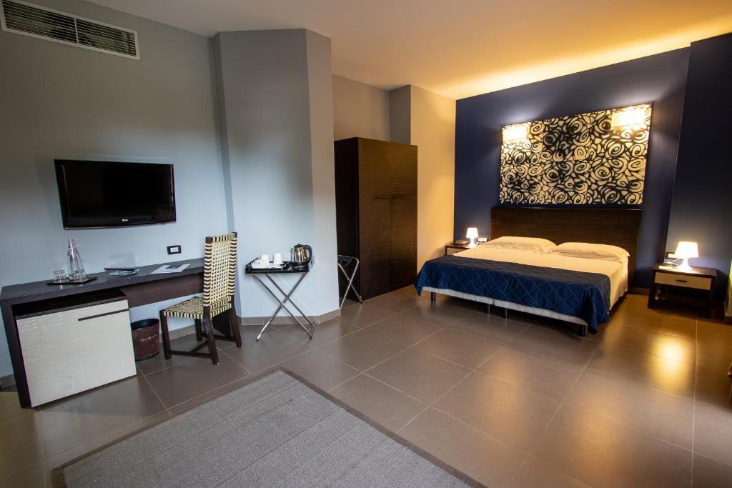 Postel nebo postele na pokoji v ubytování Le Dune Resort