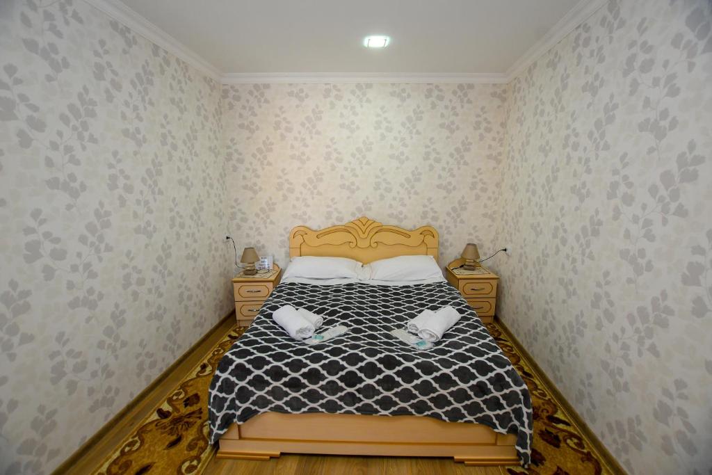Postel nebo postele na pokoji v ubytování kutaisi Sunrise