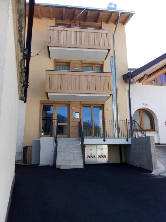 Balkón nebo terasa v ubytování Perla delle Dolomiti