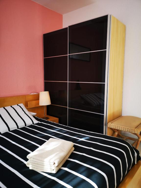 Posteľ alebo postele v izbe v ubytovaní MerieElisabethSunApartment