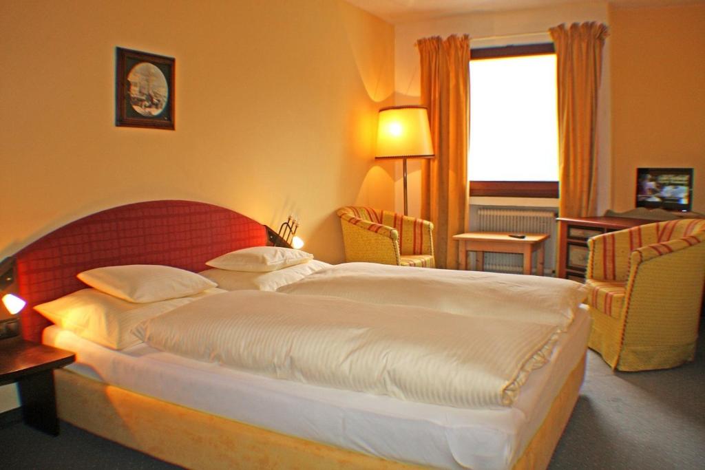 Posteľ alebo postele v izbe v ubytovaní Hotel Mooserkreuz