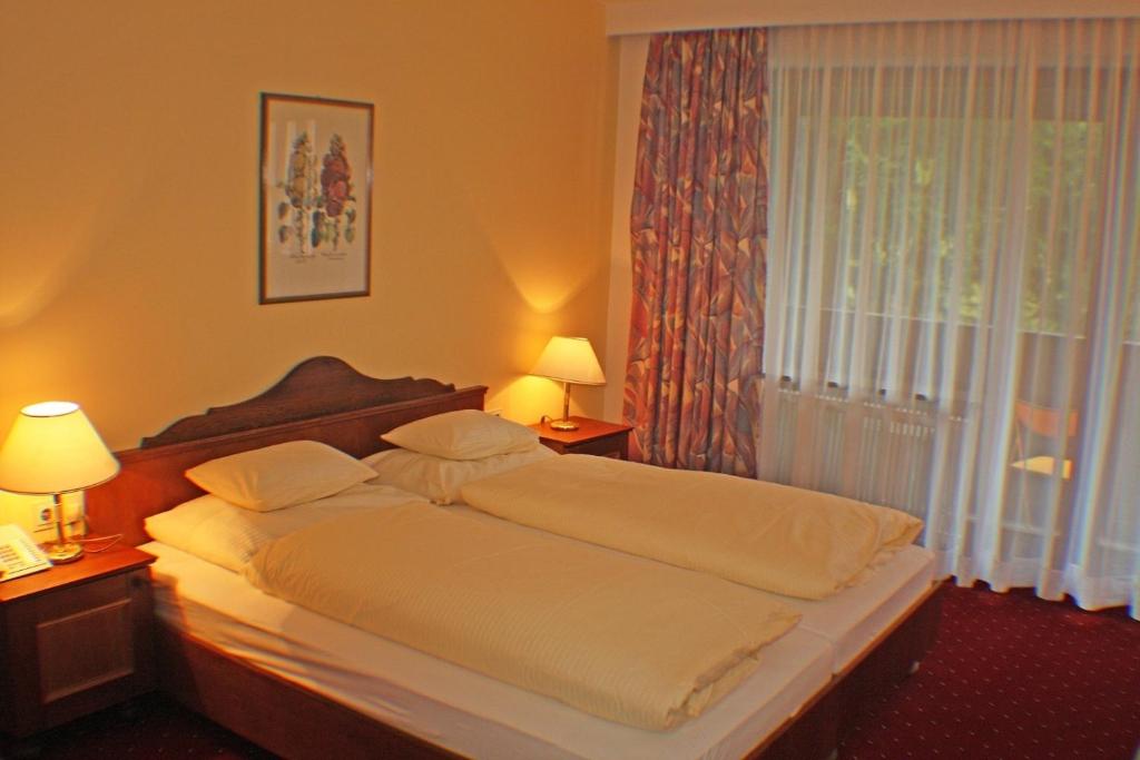 Posteľ alebo postele v izbe v ubytovaní Hotel Mooserkreuz