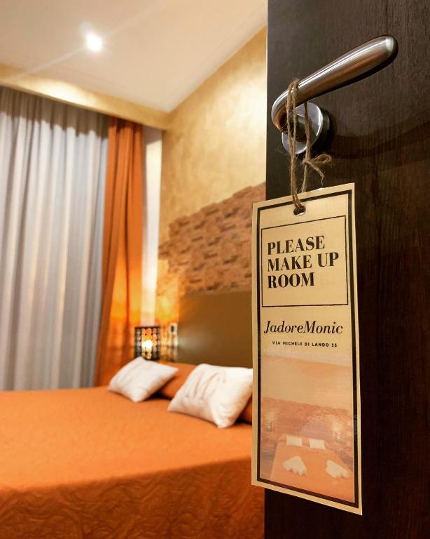 Letto o letti in una camera di Jadore Monic