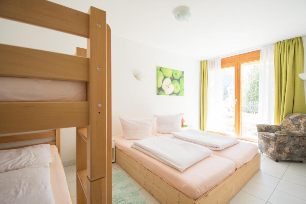 Postel nebo postele na pokoji v ubytování Hotel Cuntera