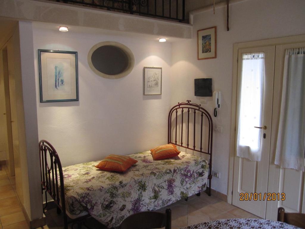 Una cama o camas en una habitación de Sax Barisano