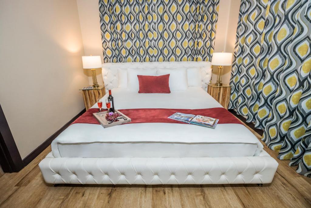 Postel nebo postele na pokoji v ubytování Metropole Suites South Beach