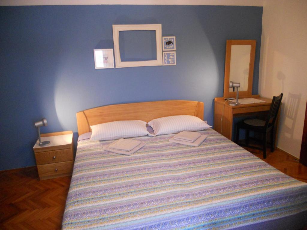 Postel nebo postele na pokoji v ubytování Room Dinko