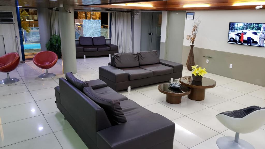 Uma área de estar em JR Hotel