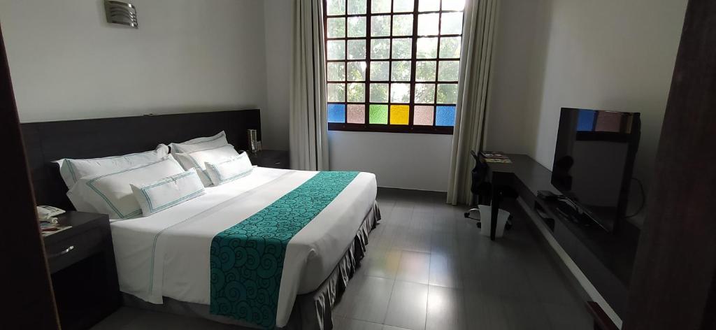 Postel nebo postele na pokoji v ubytování Hotel Union