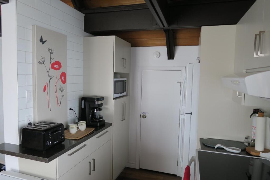 Kuchyň nebo kuchyňský kout v ubytování Chalet familial du Plateau
