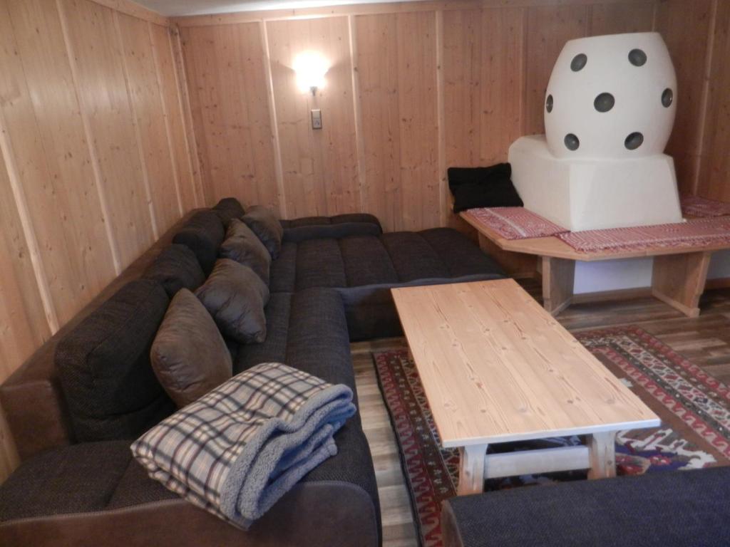 Posezení v ubytování Berghütte Schöpf