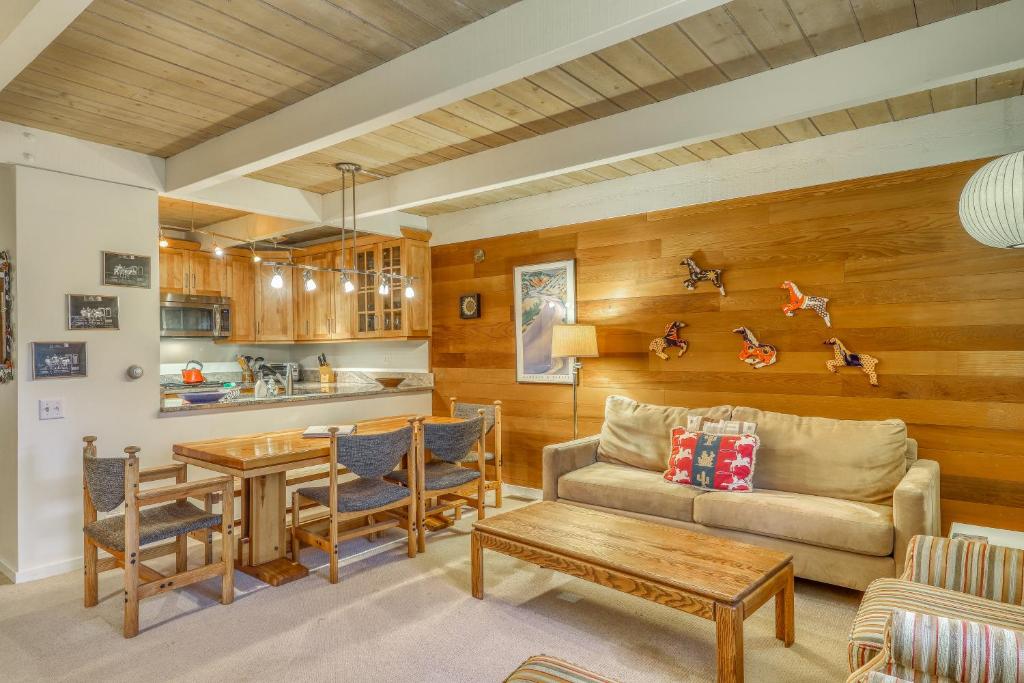 a living room with a couch and a table at Dollar Meadows 1388 in Sun Valley