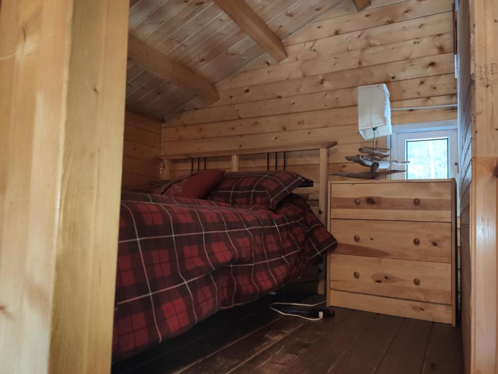 Postel nebo postele na pokoji v ubytování Coop Aventures Matawin