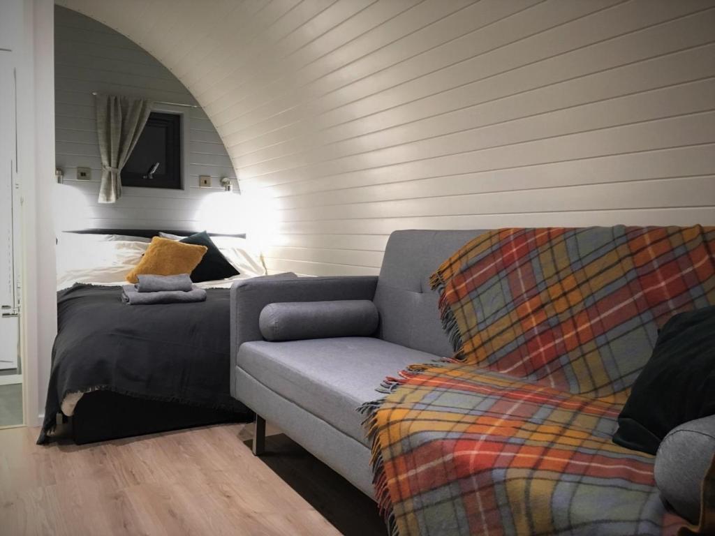 A seating area at Tomatin Glamping Pods