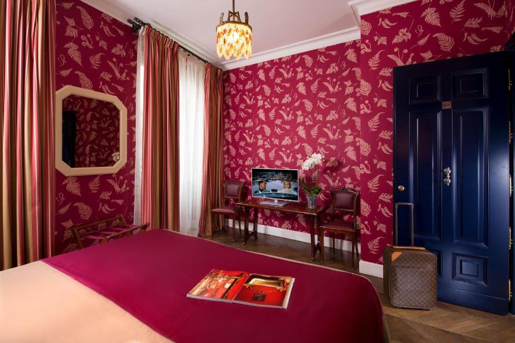 Postel nebo postele na pokoji v ubytování Boutique Hotel Anahi